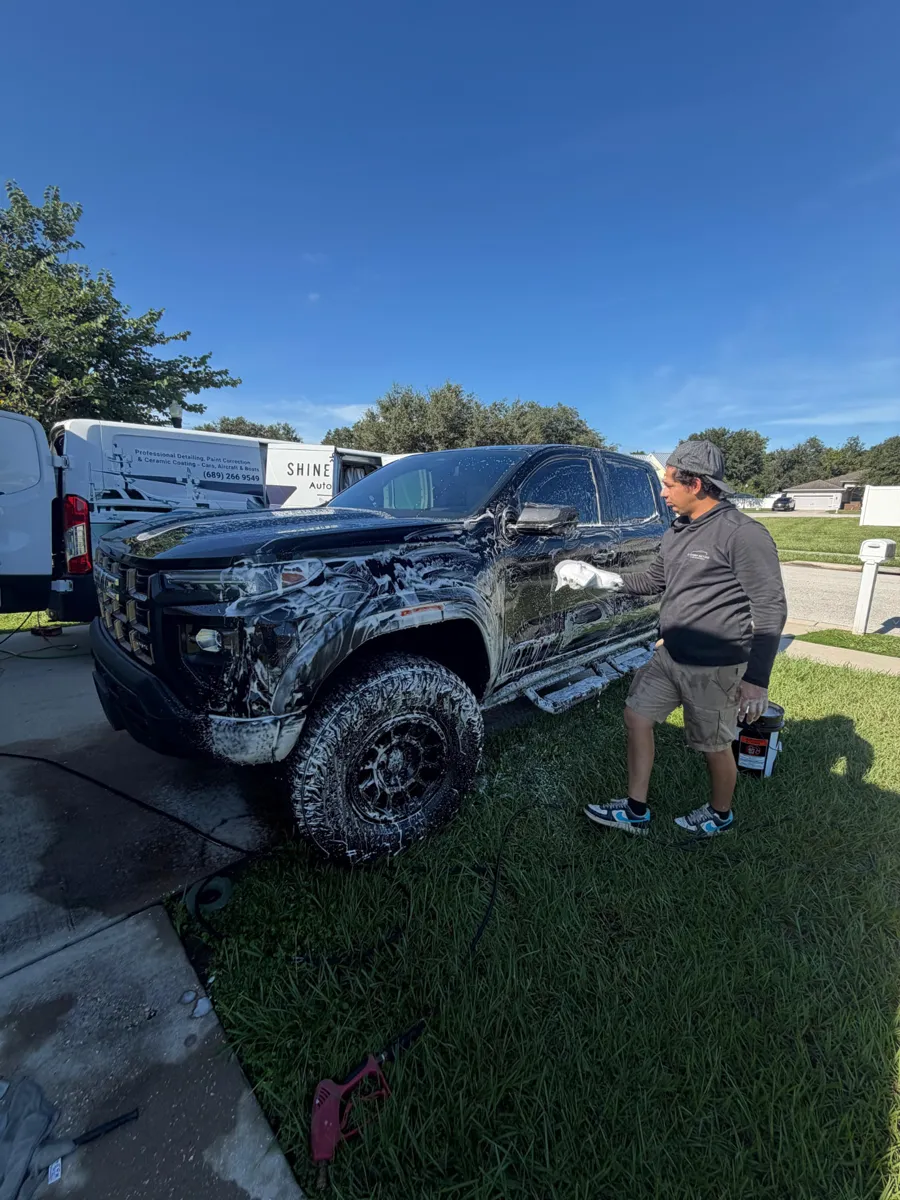 Shine Craft Auto Spa mobile detailing a pickup truck at a customer location
