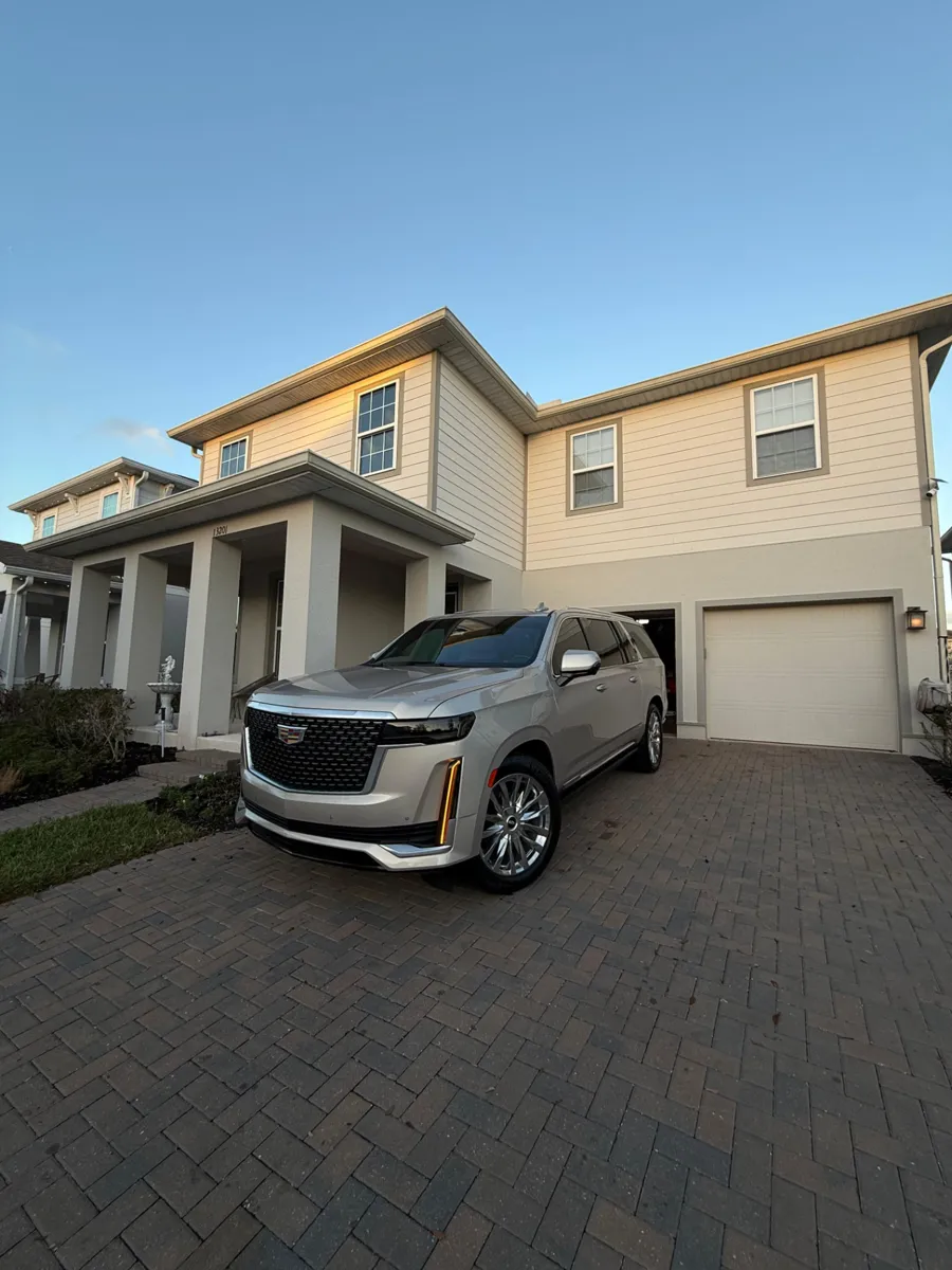 Finished silver Cadillac SUV after mobile detailing
